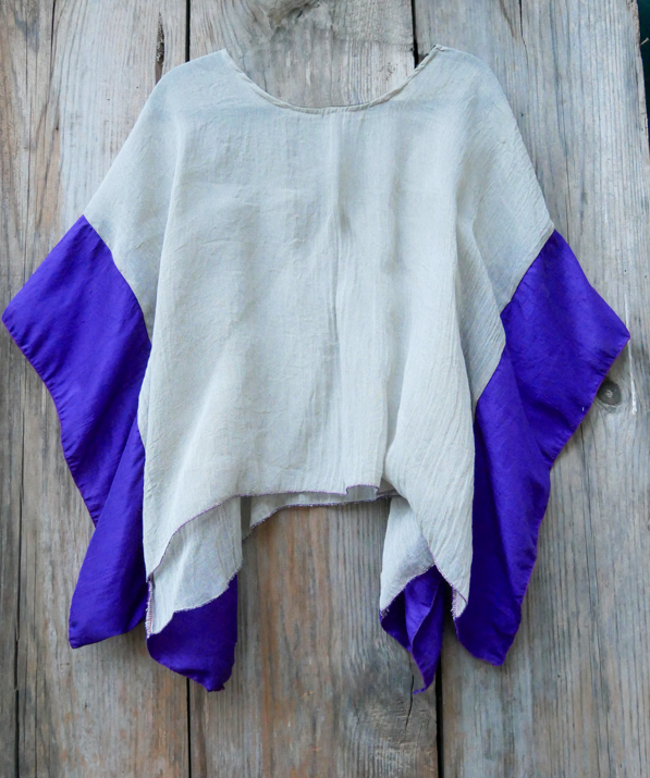 Capa de algodón con cenefa de seda.