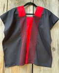 Huipil Negro con rojo.